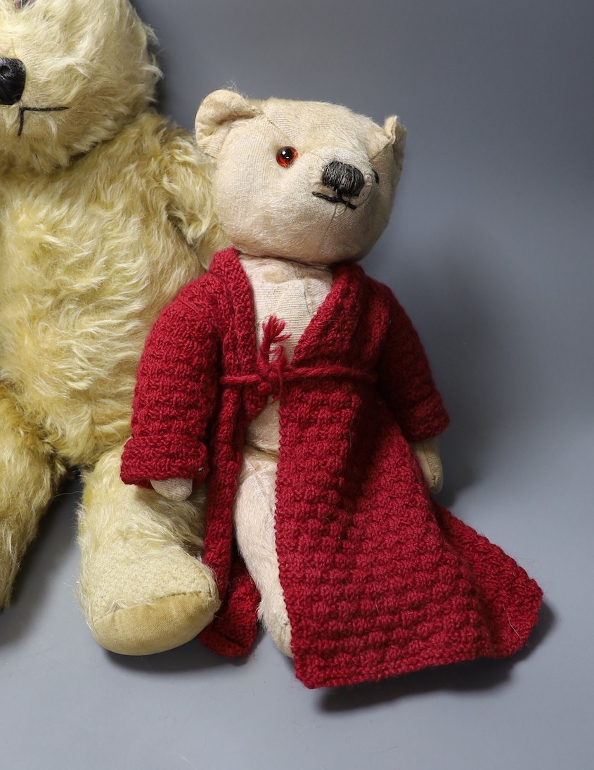 Chiltern Hugmee 1960's, 53cm, a Chadvalley 1950's, 43cm, also a Chadvalley, red gown, 35cm, and an English bear dressed as a schoolboy, 35cm.